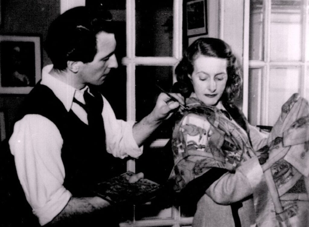 Peter Cushing painting a scarf for his wife Helen