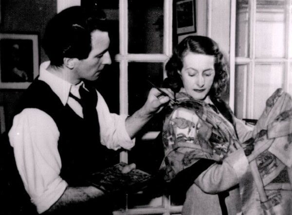 Peter Cushing painting a scarf for his wife Helen